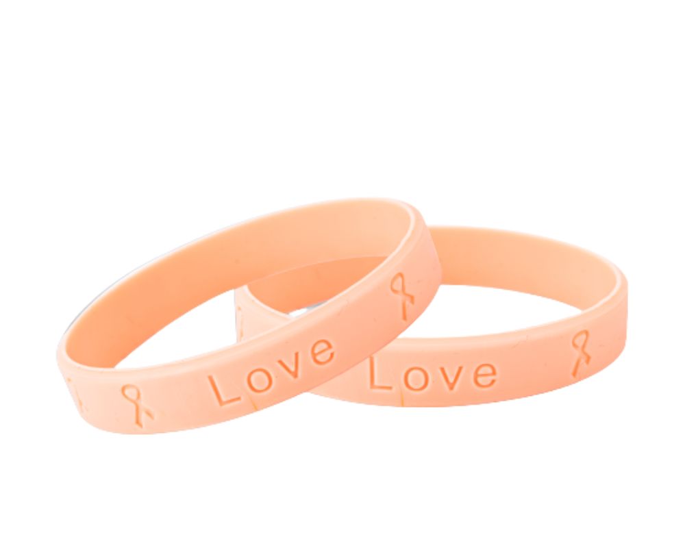 Bulk Child Size Peach Ribbon Silicone Bracelet Wristbands - The Awareness Company