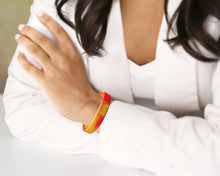 Load image into Gallery viewer, Red &amp; Yellow Silicone Bracelets - The Awareness Company