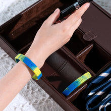 Load image into Gallery viewer, Blue &amp; Yellow Silicone Bracelets for Down Syndrome, Ukraine - The Awareness Company